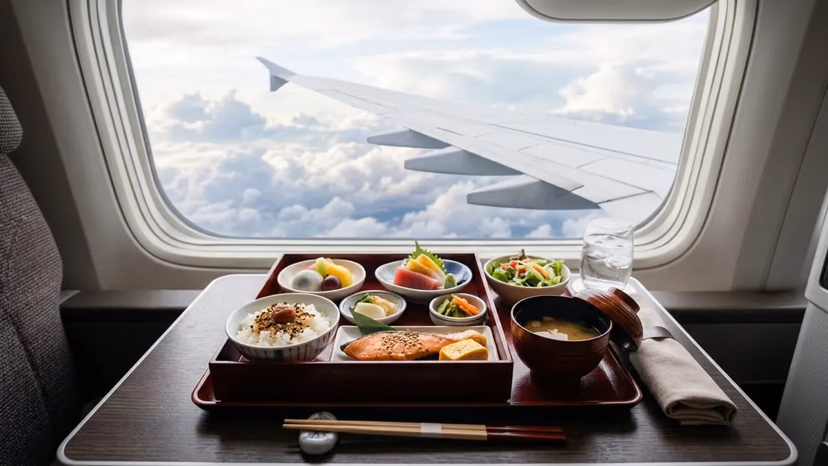 Bento-style meal on a business-class tray table