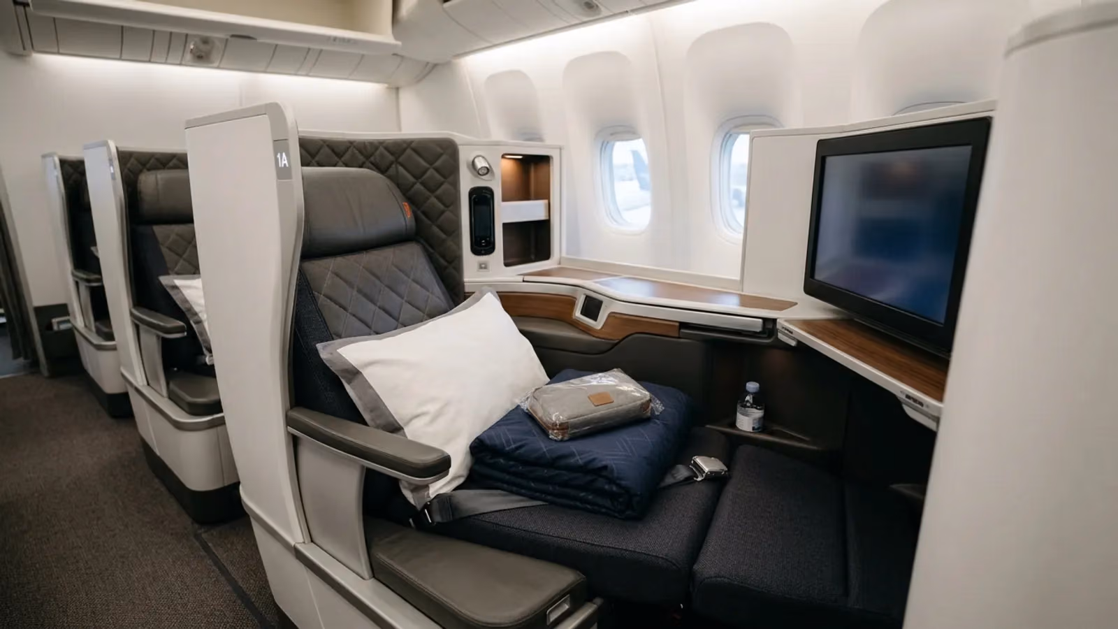 Empty business suite made up with pillow and duvet